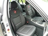 BMW 3er E90 Innenausstattung in Kundleder schwarz mit roten Nähten neu angefertigt und montiert.