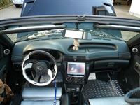 Audio System Musikanlage mit Alpine Head Unit in einem Opel Kadett Cabrio montiert.