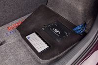 VW Polo, Musikanlage mit Kofferraumausbau und Center Speaker nachgerüstet.