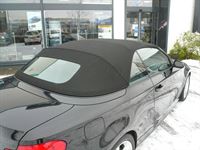 BMW 1er , Verdeckbezug Sonnenland Stoff schwarz geliefert und montiert.