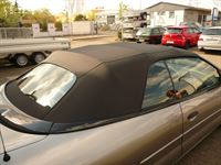 Chrysler Sebring, Verdeck Bezug in Sonnenland Stoff schwarz mit beheizter Glasheckscheibe geliefert und montiert.