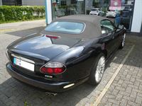 Jaguar XK8 Cabrio Verdeck Bezug in Sonnenland Stoff schwarz geliefert und montiert.