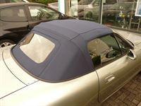 Verdeck Bezug in Sonnenland Stoff blau mit beheizter Glasheckscheibe für Mazda MX5 NB geliefert und montiert.