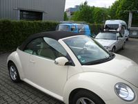 VW Beetle, Verdeckbezug in Sonnenland Stoff schwarz geliefert und montiert.