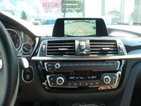 Rückfahrkamera Modul und Griffleisten-Kamera von NAVLINKZ im 4er BMW Cabrio nachgerüstet und auf das NBT2 OEM-System adaptiert.