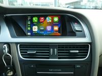 Smartphone Integration von Apple CarPlay und Android Auto wireless in ihr werkseitig verbautes MMI 3G High Navigations System von Audi.